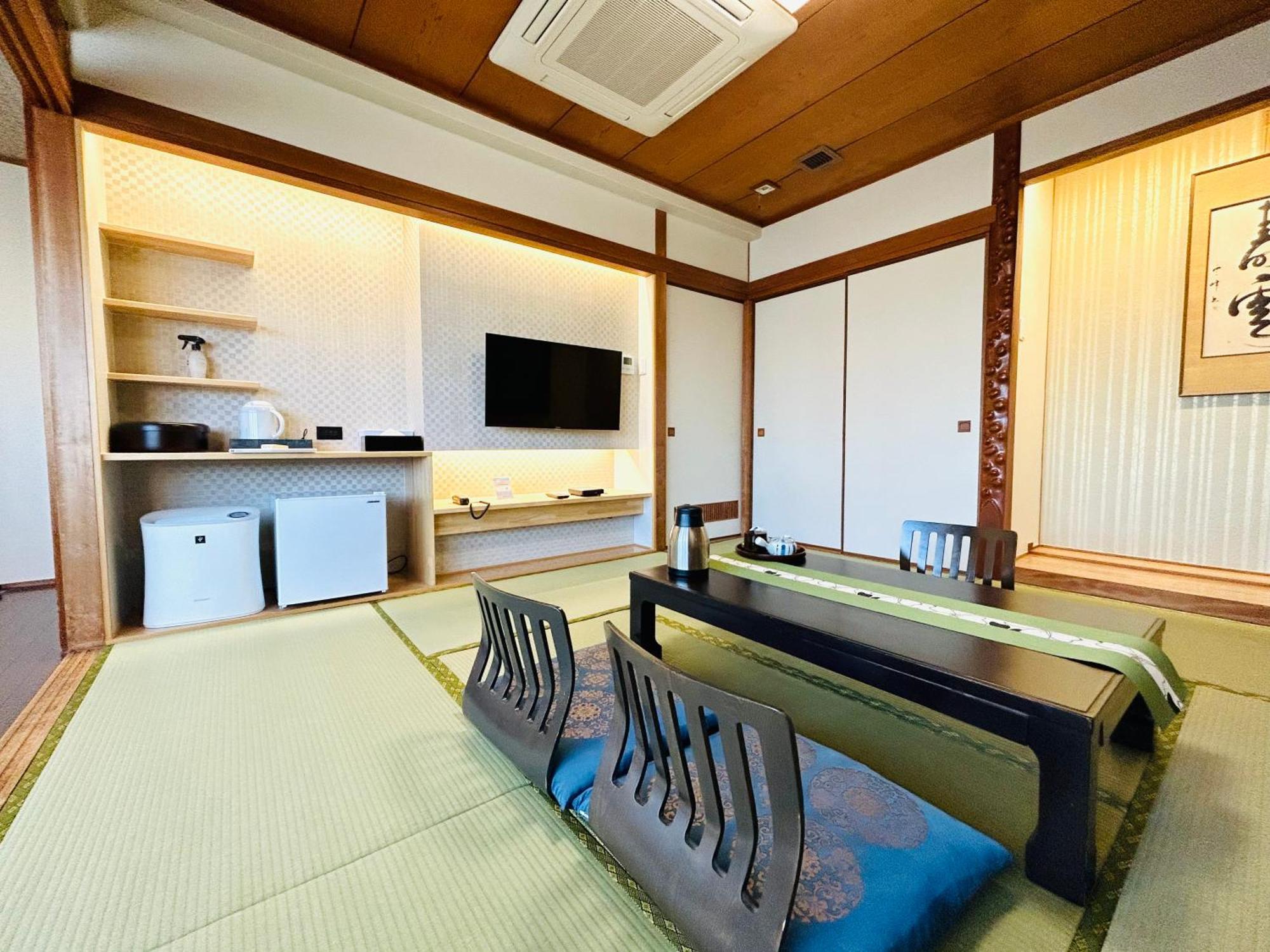 Hotel Takasago Коти Номер фото